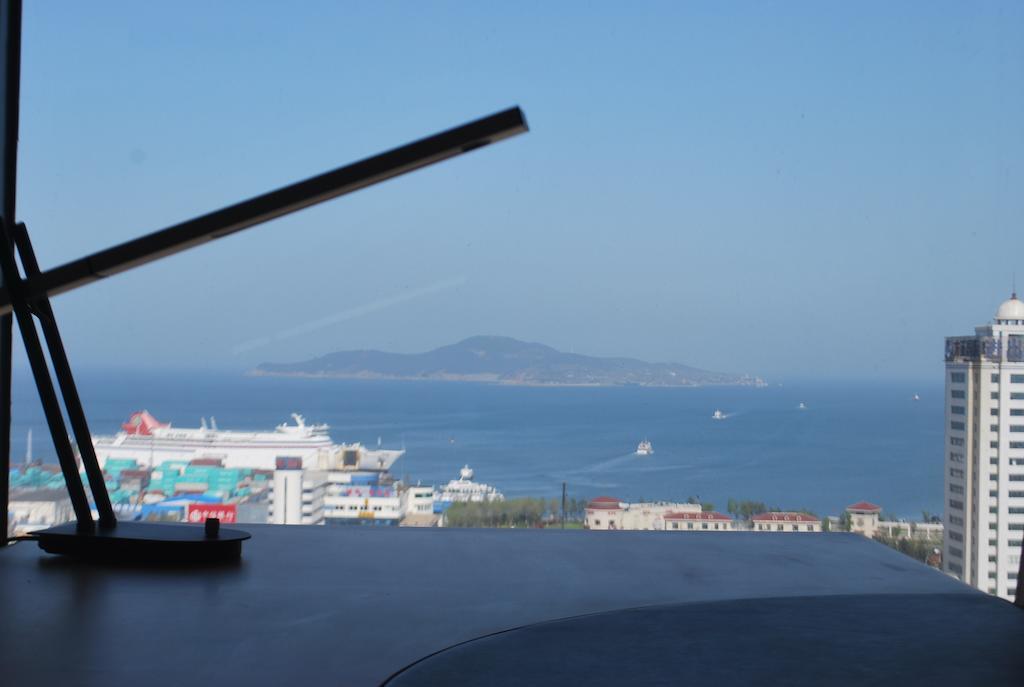 The Center Hotel Weihai Bagian luar foto