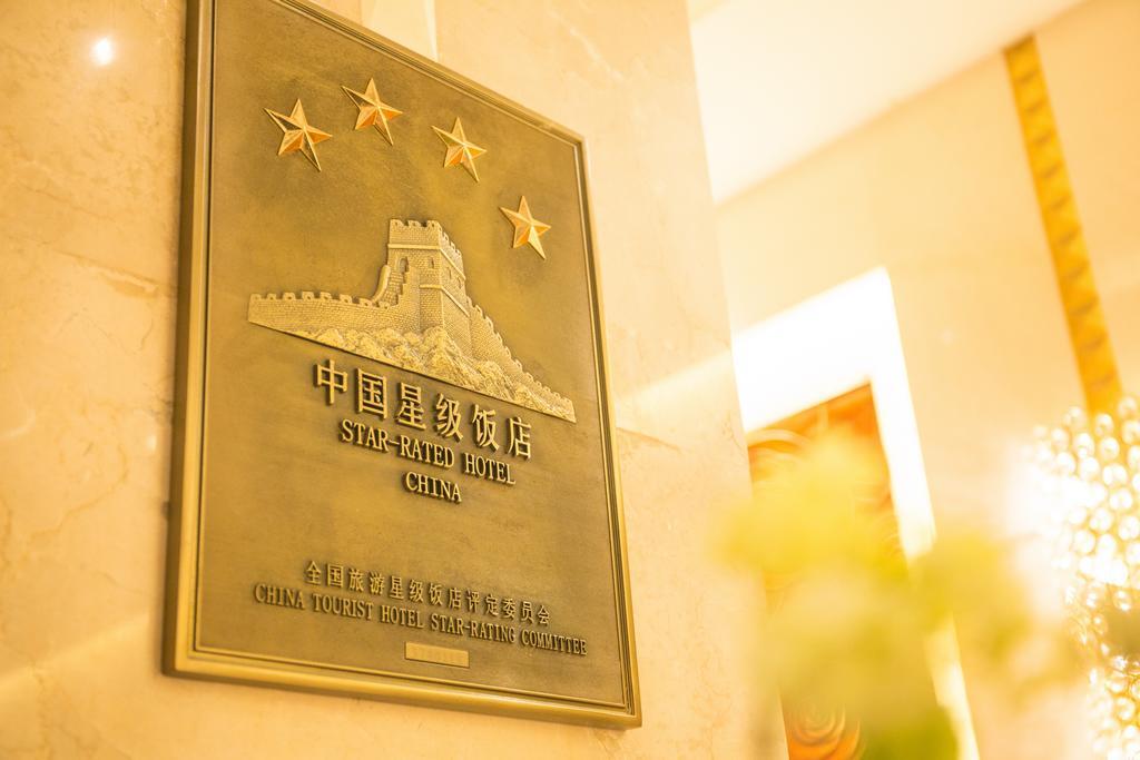 The Center Hotel Weihai Bagian luar foto